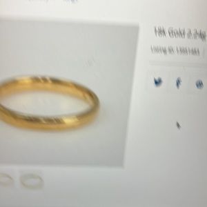 18k gold band ring.